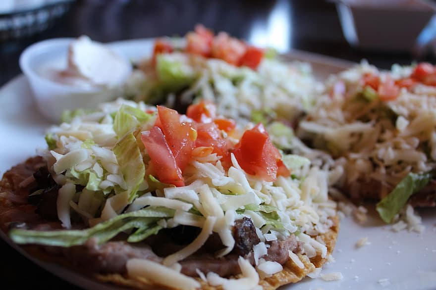 Tostada, Steak, Mexican Food, Dish, Tomatoes, Cheese, Lettuce, Food, Cuisine, Meal, Restaurant
