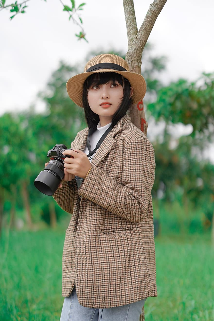 Woman, Model, Camera, Hat, Young, Style, women, one person, graphic equipment, adult, lifestyles