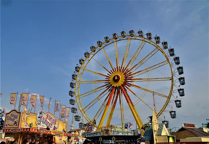 Parc d'atraccions, roda de ferris, Passeig al parc temàtic, passeig pel parc d’atraccions, Fira, Hamburg, carnestoltes ambulants, diversió, emoció, roda, festa tradicional