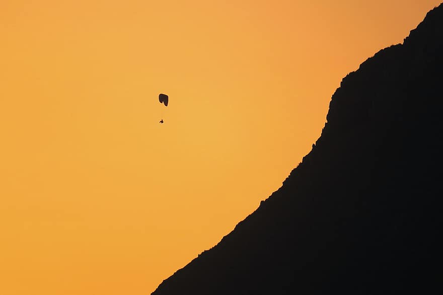 paragliding, kalns, saulrieta, siluets, slīpums, lidošana, apelsīnu debesis, izpletnis, lidojums, piedzīvojums, dom