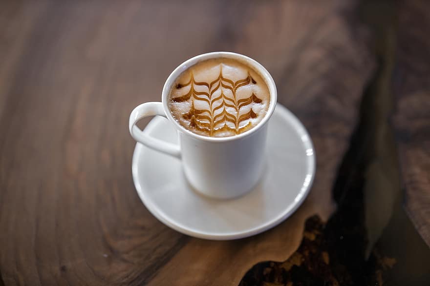 kaffe, latte, latte art, skum, mjölkskum, kopp kaffe, kaffekopp, koffein, bryggt kaffe, kopp, träbord