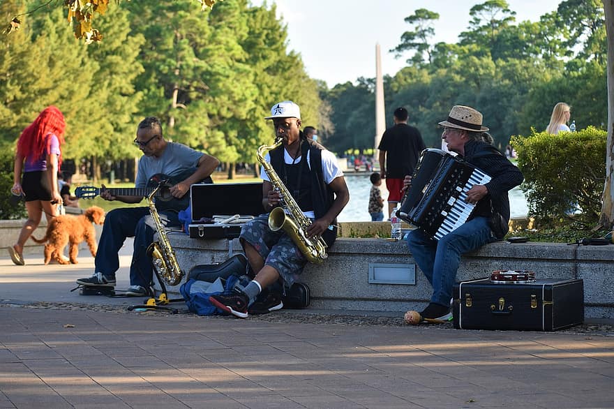 Straßenmusiker, Straßenkünstler, geschäftig, Musik-, Straßenmusikanten, Straßen-Performance, Band, Park, Houston