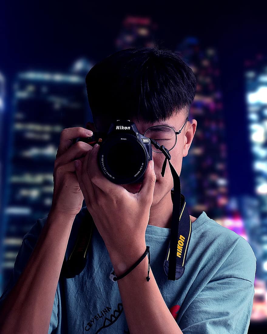 Kamera, Nikon, Fotografie, Fotograf, ein Foto machen, fotografieren, asiatischer Typ, asiatischer Mann