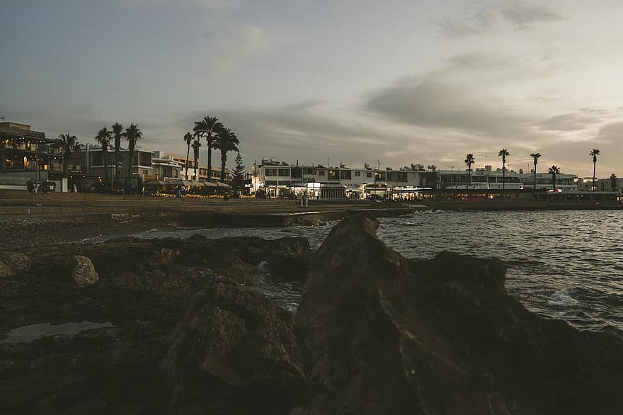 Beach, Sea, Paphos, Cyprus, Coast, Rocks, Buildings, Water, Sunset, Dusk, Evening