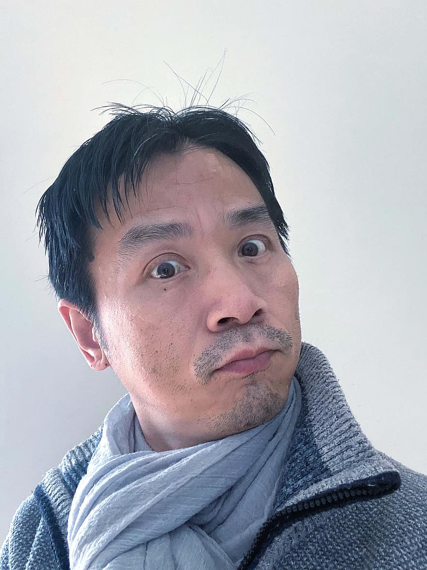 Man, Expression, Portrait, Pout, Asian, Chinese, men, one person, adult, males, looking at camera
