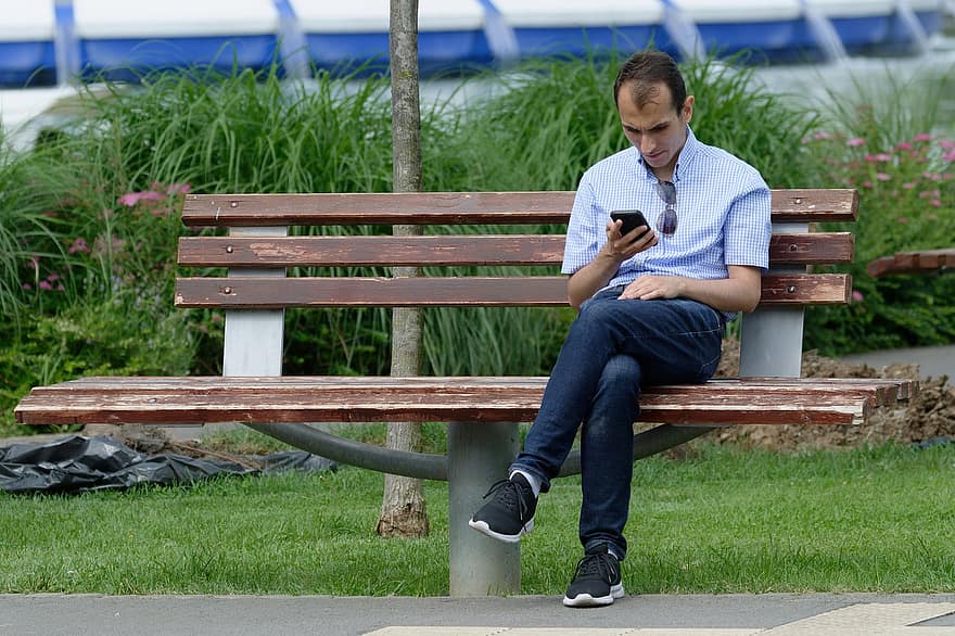 Man, Sitting, Bench, Looking, Smartphone, Park, one person, men, lifestyles, mobile phone, adult