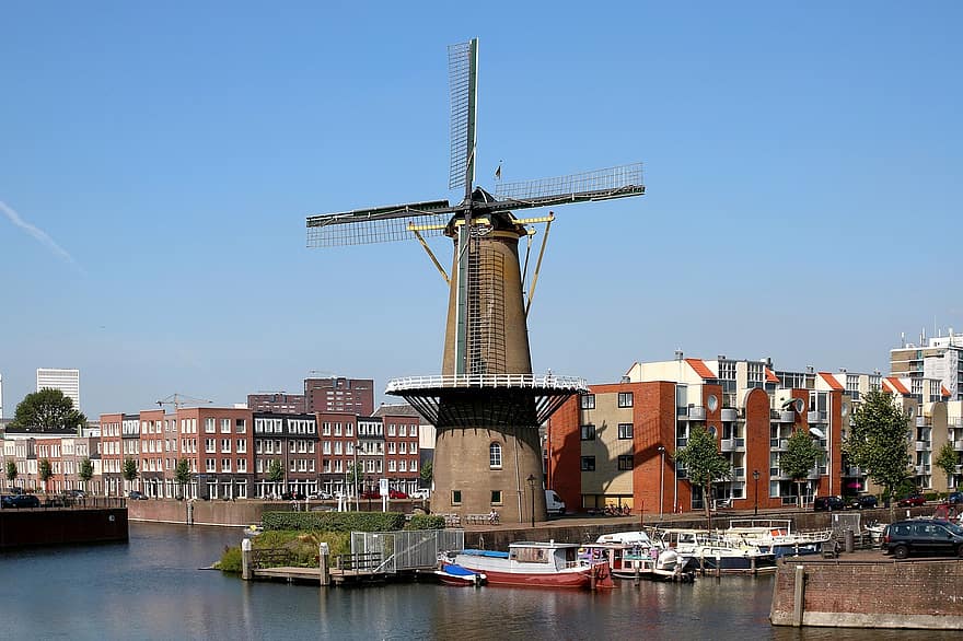 Delftshaven, Roterdama, dzirnavas, mājas, akmeņi, ūdens, laivas, koki